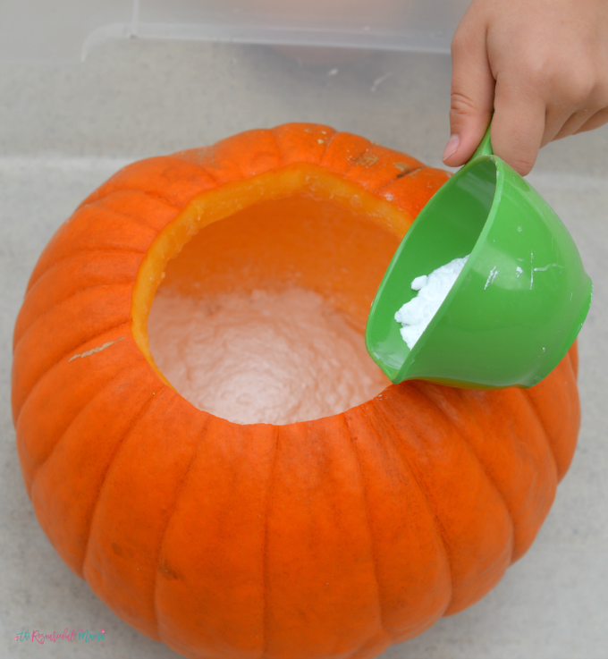 Kids will love watching as chemicals react and fizz over the sides of this pumpkin volcano, a fun and classic science experiment with a fall twist. Fall | Halloween | Pumpkins | Science | STEM 
