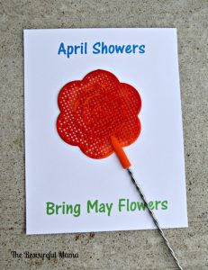 making a flower by painting with flyswatter~theresourcefulamama.com