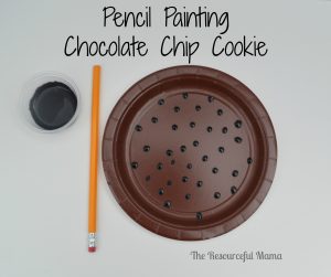 Paint "chocolate chips onto this paper plate cookie using a pencil. 