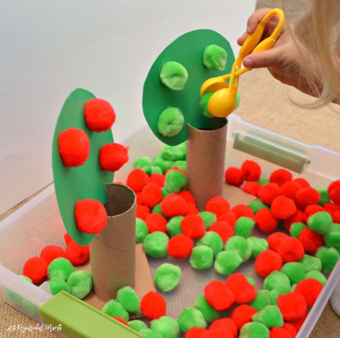 This apple themed fine motor activity combines early math, colors, and fine motor skills all in one activity for toddlers and preschoolers. By flipping the tree tops, it easily transitions to a more challenging activity for older preschoolers and kindergartners. Fall | Sorting | Early Childhood | Hand-Eye Coordination 