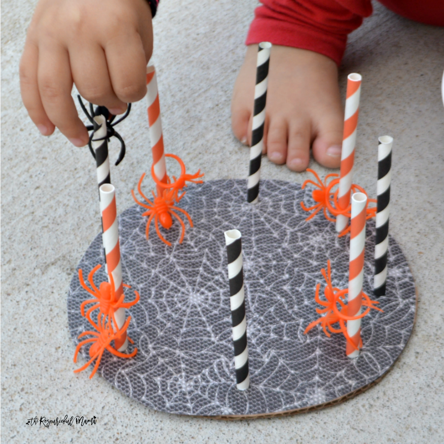 This fun spider threading activity is great for building fine motor skills, hand-eye coordination, learning colors, and developing early math skills. preschooler | toddler | Halloween | Fall | early childhood