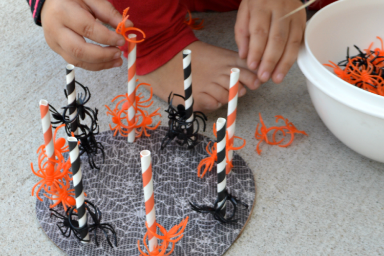 This fun spider threading activity is great for building fine motor skills, hand-eye coordination, learning colors, and developing early math skills. preschooler | toddler | Halloween | Fall | early childhood