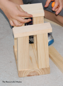 Simple play with pieces of scrap wood for kids. 