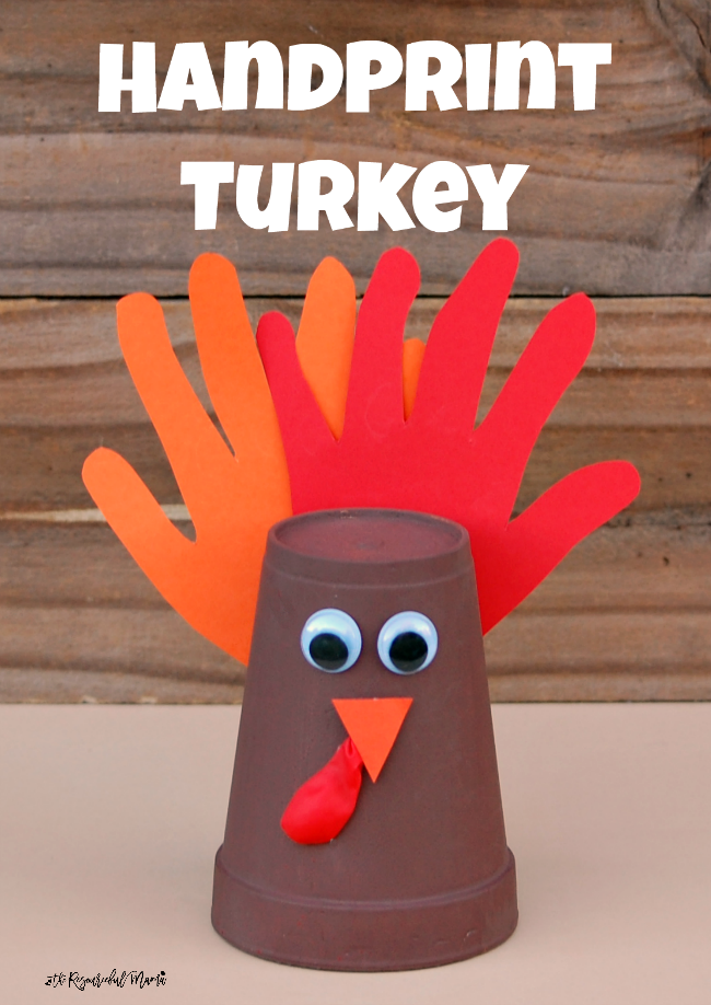 Kids using their adorable handprints to make this foam cup turkey craft for Thanksgiving. 