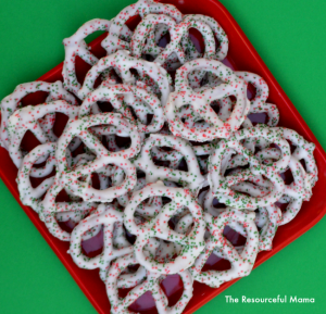 Yummy white chocolate pretzels for Christmas. Super easy, no bake Christmas treats that they kid can help make. Makes a great homemade gift. 