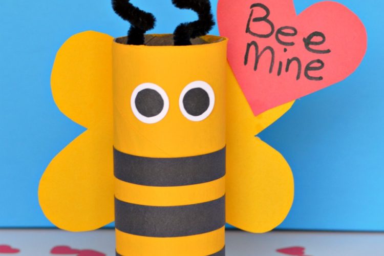 Turn your recycled paper rolls into a cute bee mine valentine day craft.