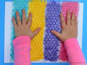 pressing bubble wrap onto the egg