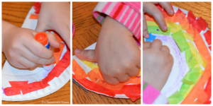 Tissue paper and paper plate rainbow kid craft perfect for St. Patrick's Day or spring and summer.