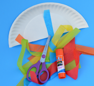 Tissue paper and paper plate rainbow kid craft perfect for St. Patrick's Day or spring and summer.
