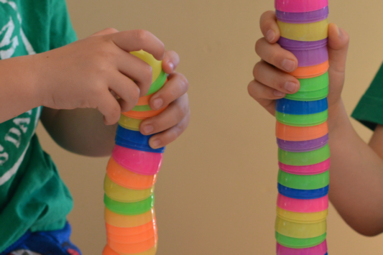 Challenge kids to an Easter egg tower STEM challenge using plastic Easter eggs.