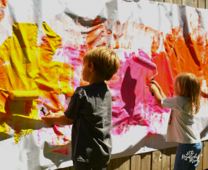 My kids love to help roller paint! This is a great way to for them to roller paint freely. kids|process art|summer|outdoor activity|preschool|kindergartener|school age kids|painting