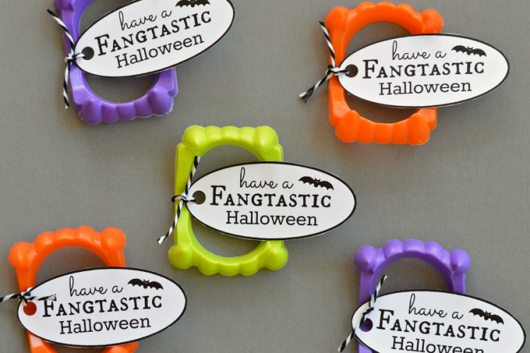 Turn plastic vampire fangs into a simple, inexpensive, and non-candy Halloween favor with this fun printable tag for class parties and trick-or-treaters.