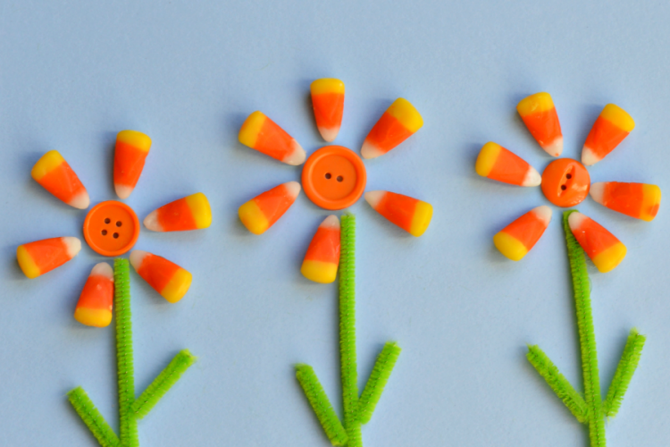 Transform leftover candy corn into a flower craft. fall | Halloween | kids craft