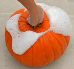 Kids will love watching as chemicals react and fizz over the sides of this pumpkin volcano, a fun and classic science experiment with a fall twist. Fall | Halloween | Pumpkins | Science | STEM