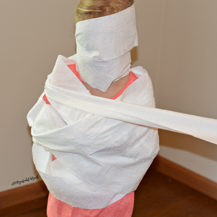 Kids will be giggling and shrieking with laughter as they play this wrap the mummy halloween game. It's an easy game to set up and play during school classroom parties.