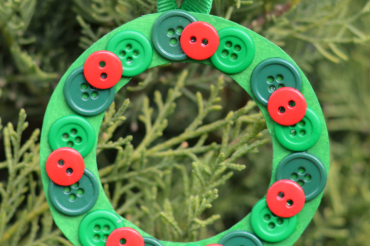 This Christmas wreath button ornament is a great ornament for kids to make for the Christmas tree or as a gift.