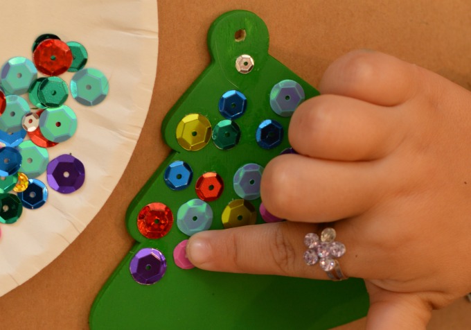 Add some shine to your Christmas tree with these wooden kid made tree ornaments. 