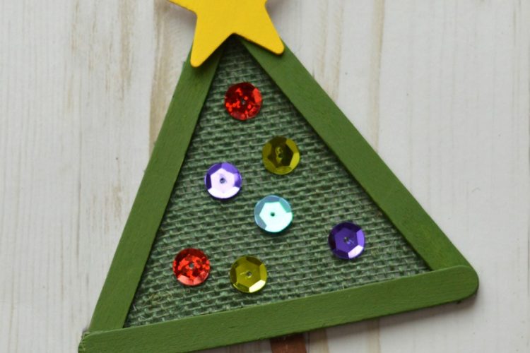 This Christmas Tree Ornament combines burlap, craft sticks and few other craft items in a lovely ornament for your Christmas tree.