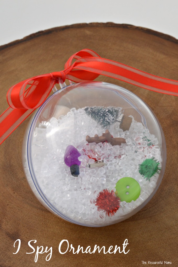 The kids loved shaking their I Spy Ornaments and finding all the treasures hidden in their ornament. Christmas | homemade ornament