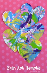 These spin art hearts create a stunning and colorful process art activity for Valentine's Day. kids artwork