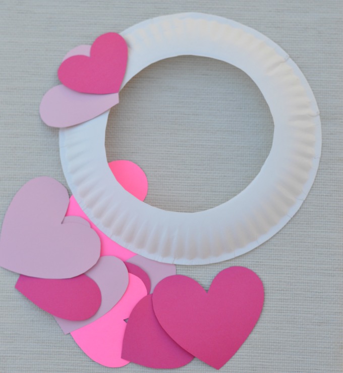 Kids can help decorate for Valentine's Day with this paper plate heart wreath craft. 