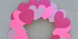 Kids can help decorate for Valentine's Day with this paper plate heart wreath craft.