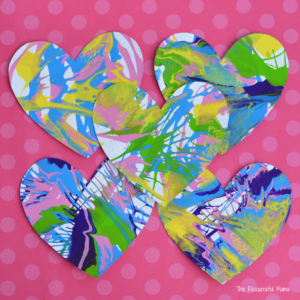These spin art hearts create a stunning and colorful process art activity for Valentine's Day. kids artwork