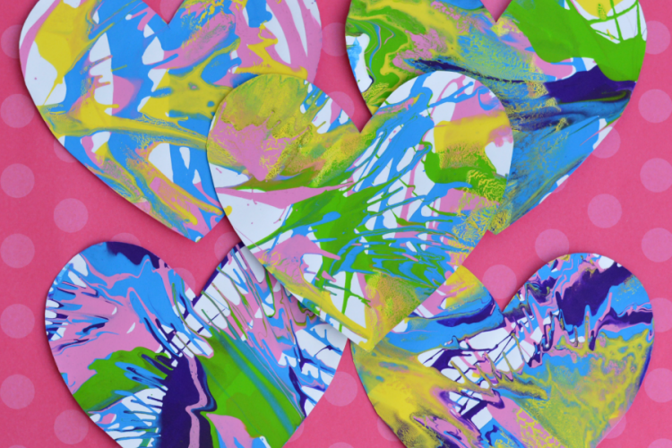 These spin art hearts create a stunning and colorful process art activity for Valentine's Day. kids artwork