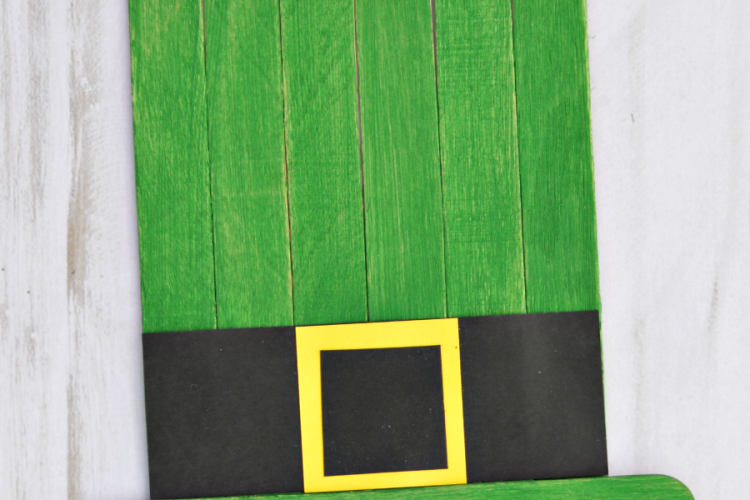 Leprechaun hat craft kids can make for St. Patrick's Day from craft sticks.