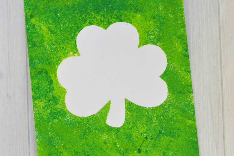 Shamrock resist sponge painting a fun St. Patrick's Day art project for kids