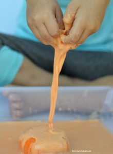 Playing with Pumpkin Goop (a.k.a. Oobleck) is a fun, tactile fall sensory activity that your children are sure to love.