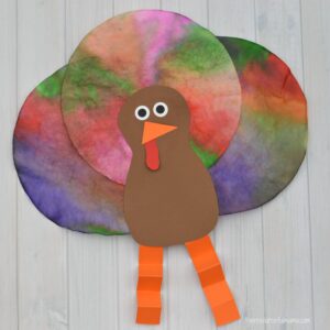 This Coffee Filter Turkey Craft is a quick, easy, and inexpensive craft kids can make for Thanksgiving. It uses a fun technique to color the coffee filters. 