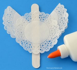 Turn paper dollies and a craft stick into a cute angel ornament the kids can make for the Christmas tree.