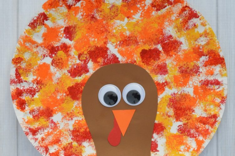 This Thanksgiving Turkey Craft uses a fun sponge painting technique on paper plates for the turkey's feathers that kids will love. 