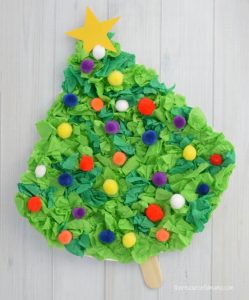 This Crepe Paper Christmas Tree Craft uses paper plates, crepe paper, and pompoms to create a fun and festive Christmas kid craft.