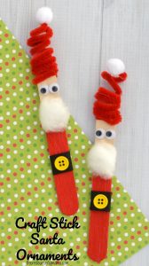 The whimsy pipe cleaner hat on this Craft Stick Santa Ornament is so fun! Kids will love to make this Santa ornament and hang it on the Christmas tree
