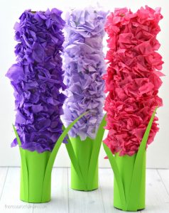 Transform paper towel rolls and tissue paper into a lovely hyacinth flower craft kids can make this spring. 