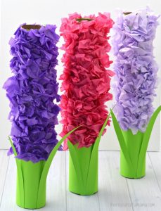 Transform paper towel rolls and tissue paper into a lovely hyacinth flower craft kids can make this spring. 