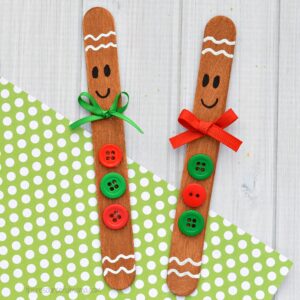 Transform basic craft sticks into this super cute gingerbread man ornament for your Christmas tree. 