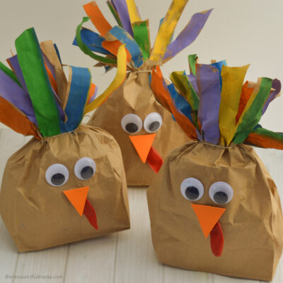 Turn your brown paper lunch bags into a plump and playful stuffed paper bag turkey craft for kids this Thanksgiving. This easy, inexpensive craft is quick and easy to put together with items you likely have on hand. They make a cute homemade decoration for your Thanksgiving table. 